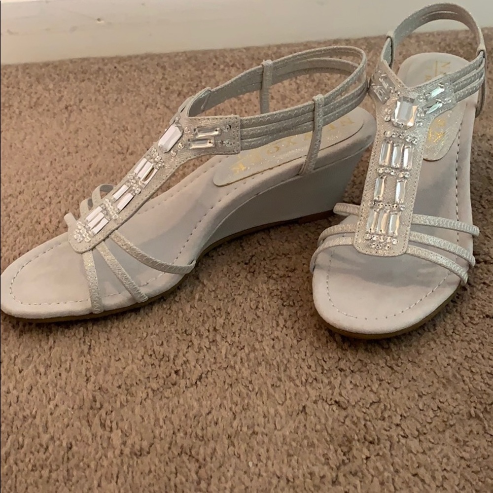 Woman’s silver formal sandals